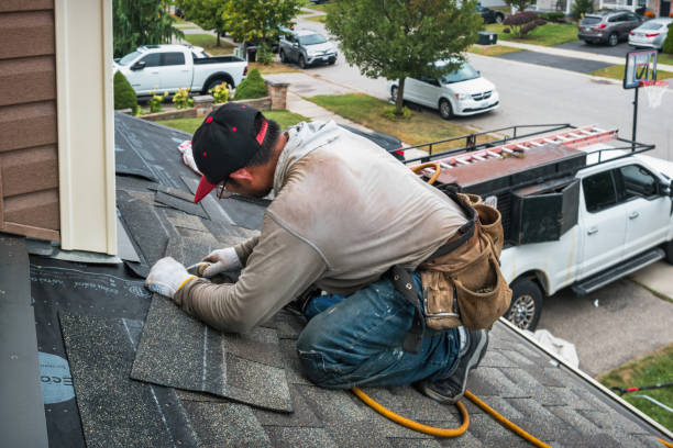 Professional Roof Repair technician working in Martell, CA
